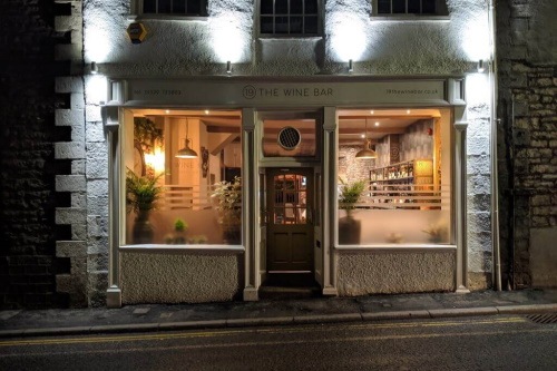 Front of the bar at night